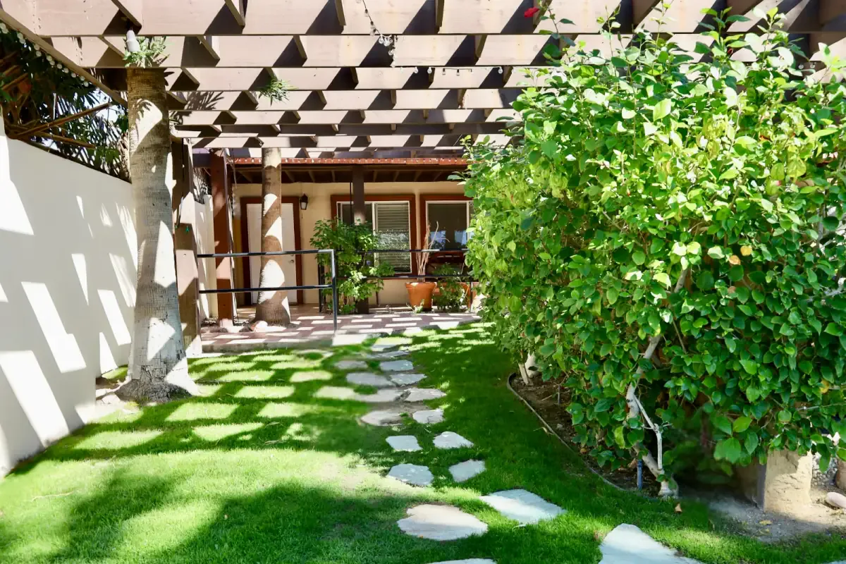 Luxury Addiction Treatment in Desert Hot Springs, CA Shaded garden walkway for luxury addiction treatment in Desert Hot Springs, CA at Living Longer Recovery
